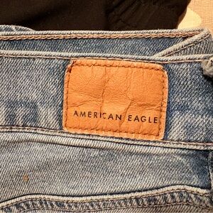 American Eagle Outfitters Light Blue Denim Flare Jeans with Tan Leather Patch